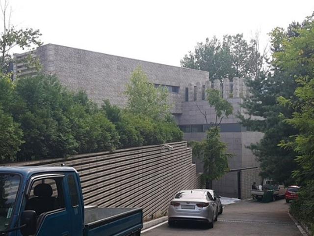 “담철곤 부부, 신불자 명의 빌려 수질보전지역에 호화별장”
