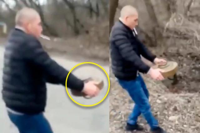 돌 옮기듯(?) 맨손으로 지뢰 옮기는 모습 공개된 우크라이나 남성